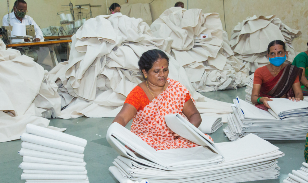 lady sorting & segregating cloth